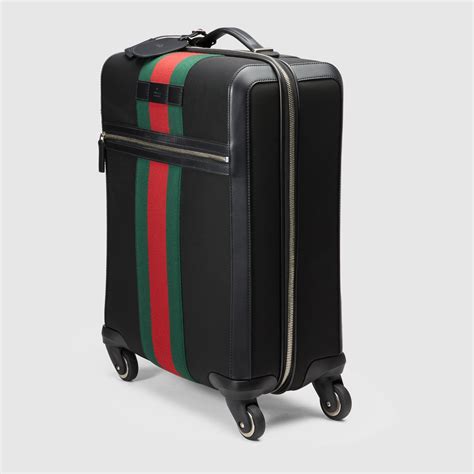 suitcase on wheels gucci